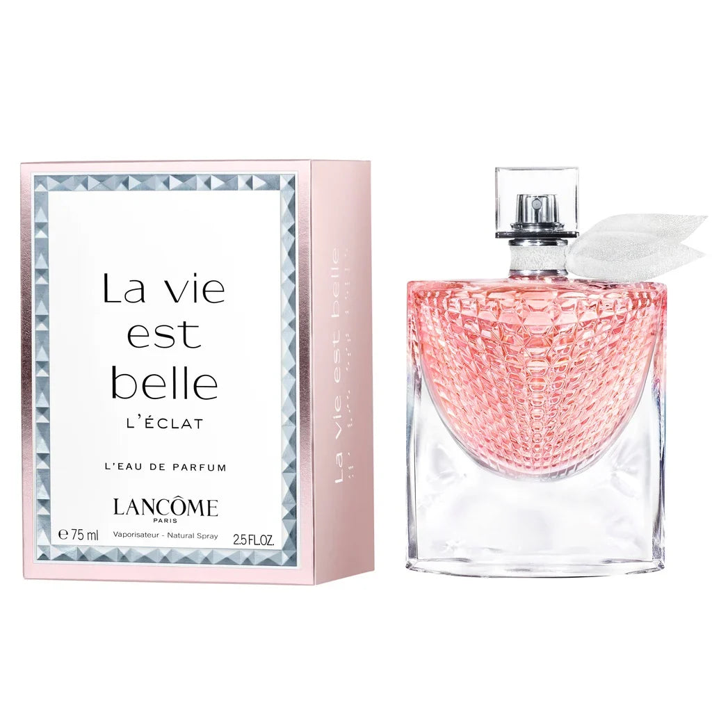 Lancome perfume bottle and packaging with 'La vie est belle' text.