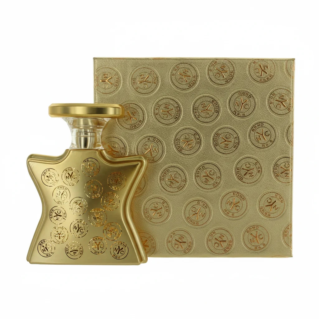 Gold perfume bottle and packaging with a pattern on a white background